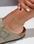 Model wearing 14k gold fill Brooklyn anklet