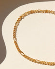 Capri Bracelet in 14k gold fill on a white paper