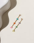 Disco Opal Earrings featuring six multicolored opals on a bar, dot, and dash chain design in gold fill
