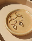 gorgeous glam gold hoops with crystal quartz handcrafted by Token Jewelry in Eau Claire, Wisconsin