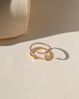 Lumen Ring handcrafted in 14k gold fill with a light-catching hammered texture.