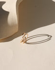 Lumen Ring handcrafted in 14k gold fill with a light-catching hammered texture.