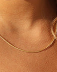 Makara Chain by Token Jewelry in 14k gold fill, close up photographed on a model