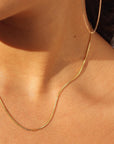 model wearing 14k gold fill curb chain neckalce