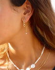 Model wearing Alex Pearl Studs