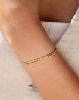 Model wearing 14k gold fill Demi Alexandra Bracelet.