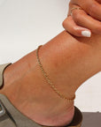 Model wearing 14k gold fill Roen anklet