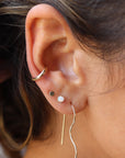 Model wearing 14k gold fill simple ear cuff