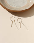 Token Jewelry’s Raya Keyhole Threaders — high-shine, handcrafted threader earrings in 14k gold fill or sterling silver with playful movement.