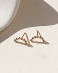 14k gold fill sequin wire stud earrings on a light background