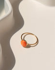 Sienna Ring featuring a vibrant spiny oyster gemstone on a hand-hammered sterling silver band.