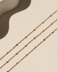 14k gold filled Sunspell Chain featuring delicate, light-reflecting links designed for layering or everyday wear.