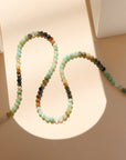 Tidepool Necklace featuring green chrysocolla and blue azurite beads on a delicate chain