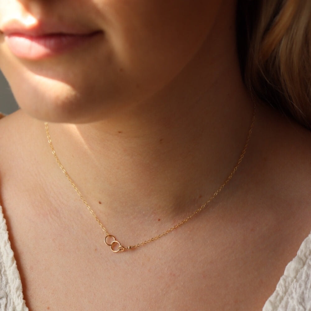 14k gold fill Lineage Necklace. This necklace features jump rings representing parents, kids, and others you are able to pick the sizing of each jump ring.