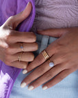 Model Wearing 14k gold fill Blue Lace Agate Ring. This Ring Features a simple band with light hammering around the sides, this ring also features the Blue Lace Agate Ring.