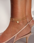  Model wearing 14k gold fill anklet featuring a freshwater pearl 