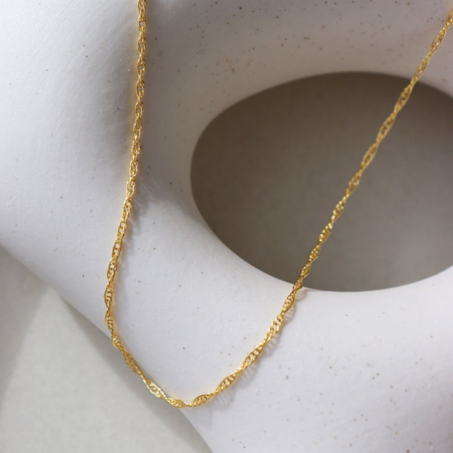 14 Gold Filled delicate rope chain displayed on a white background