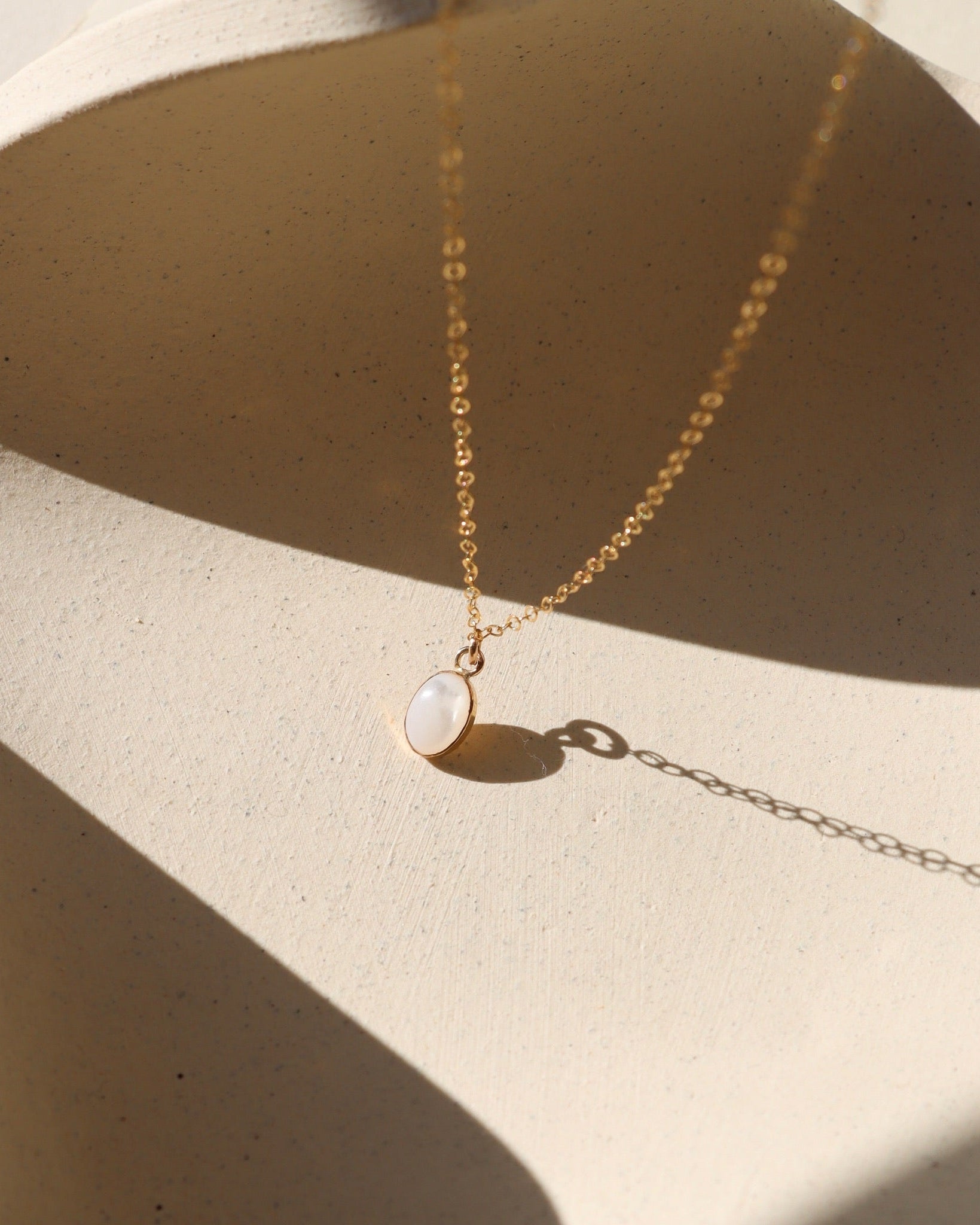 mother of pearl bezel pendant on a 14k gold fill delicate chain