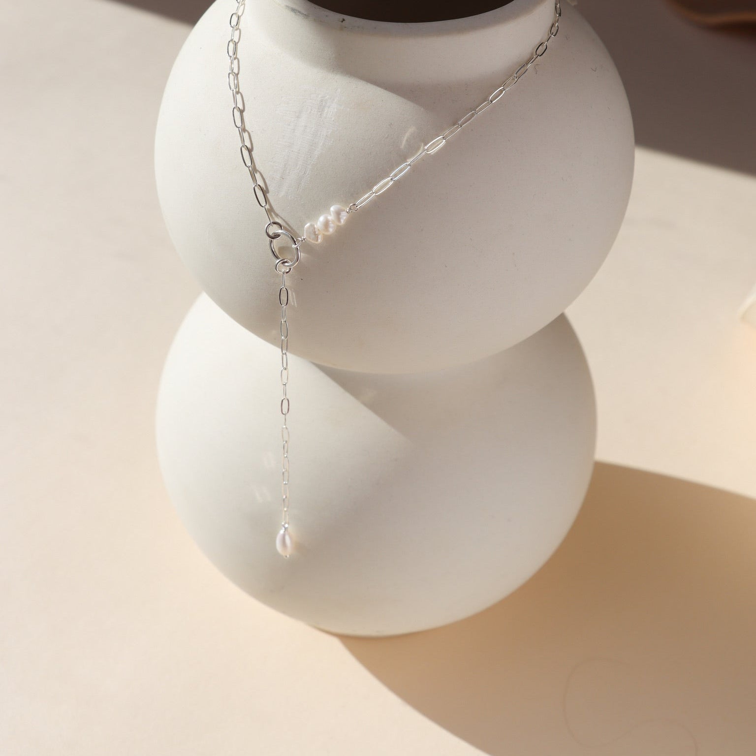 Elegant Ava Pearl Necklace crafted in sterling silver, showcasing timeless simplicity with a glowing freshwater pearl.