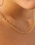 14k gold fill chain necklace on a model