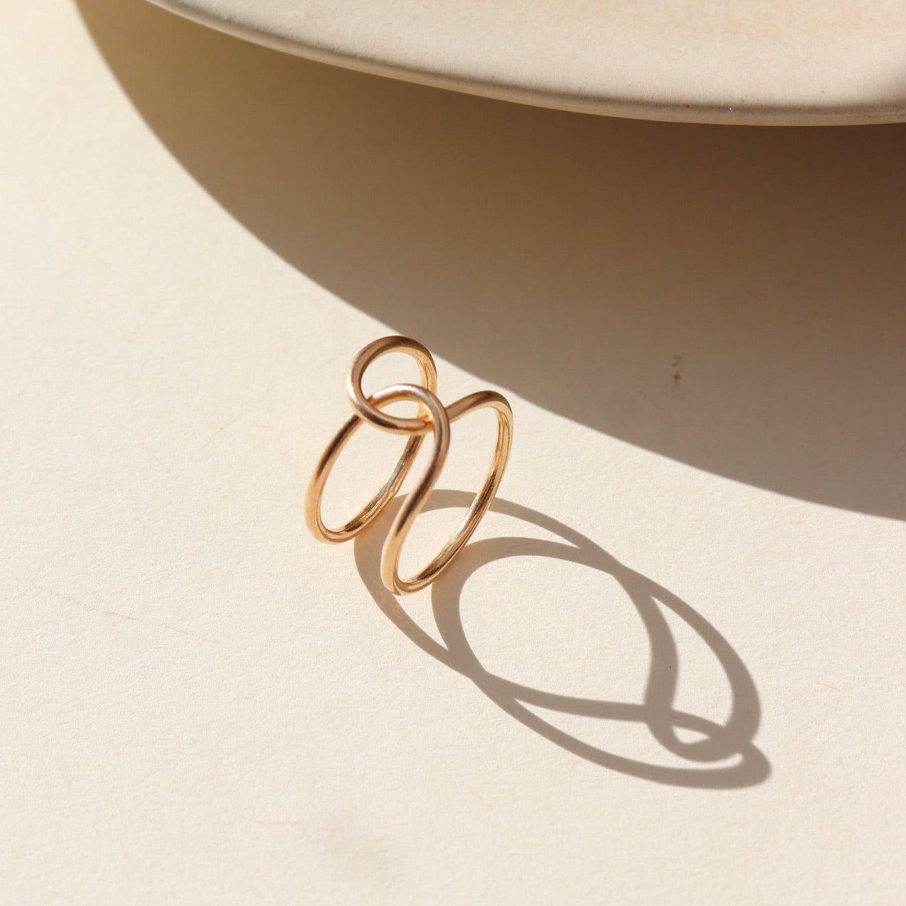 14k gold filled buckle ring in the sun.