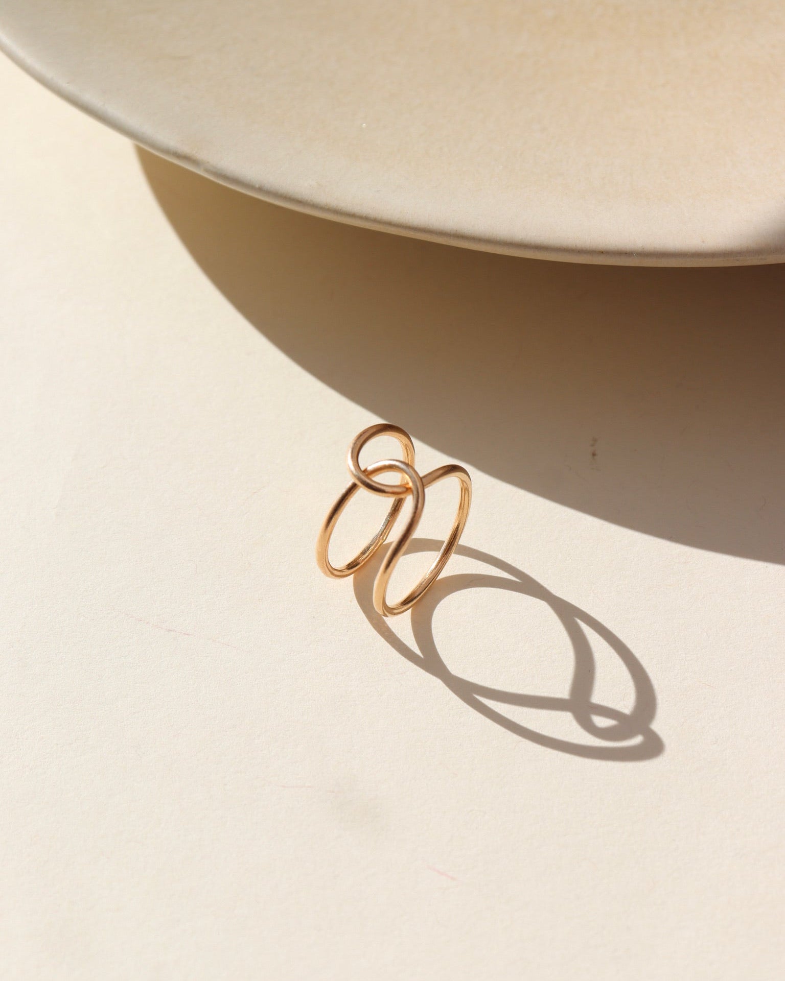 14k gold filled buckle ring in the sun.