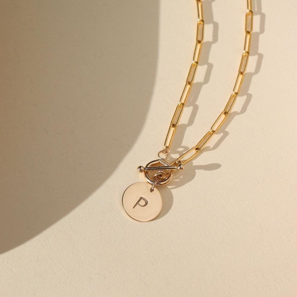 14k gold fill bold paperclip chain necklace with toggle clasp and a hand stamped disc