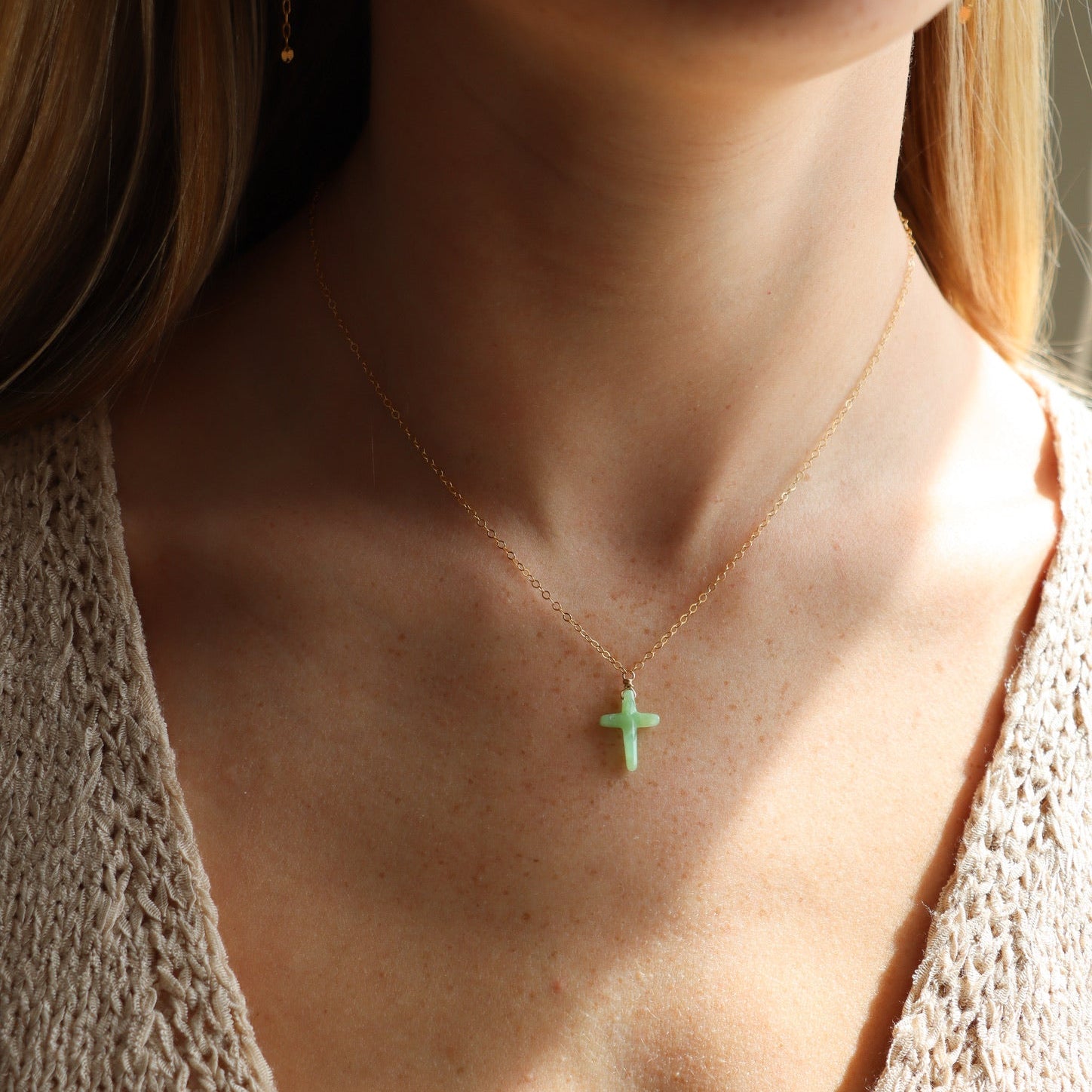model wearing 14k gold fill delicate chain necklace with Chrysophrase cross charm