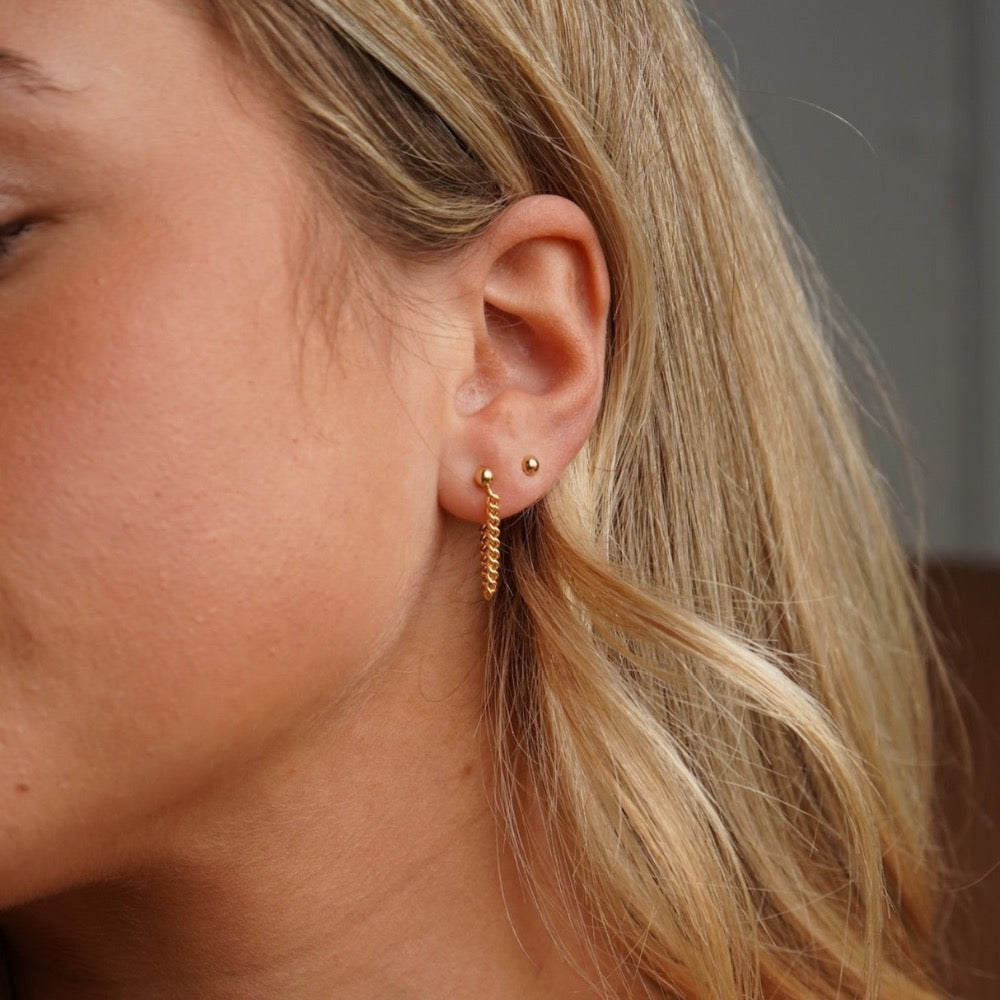 Model wearing 14k gold fill Classic studs