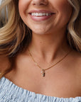 Model wearing 14k gold fill Orion Necklace