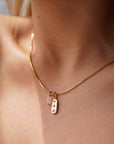 Model wearing 14k gold fill Orion Necklace