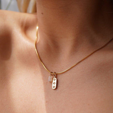Model wearing 14k gold fill Orion Necklace