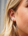 Model wearing 14k gold fill Spiral ear cuff