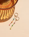 Disco Drop Earrings with colorful opals hanging from links.