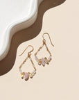 The Estella Earrings feature moonstone, kunzite, and citrine drops on a gold fill or sterling silver chain. Lightweight, feminine earrings with subtle movement.