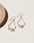 The Estella Earrings feature moonstone, kunzite, and citrine drops on a gold fill or sterling silver chain. Lightweight, feminine earrings with subtle movement.