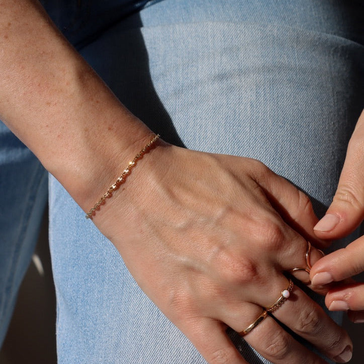 model wearing 14k gold fill sparkly chain bracelet
