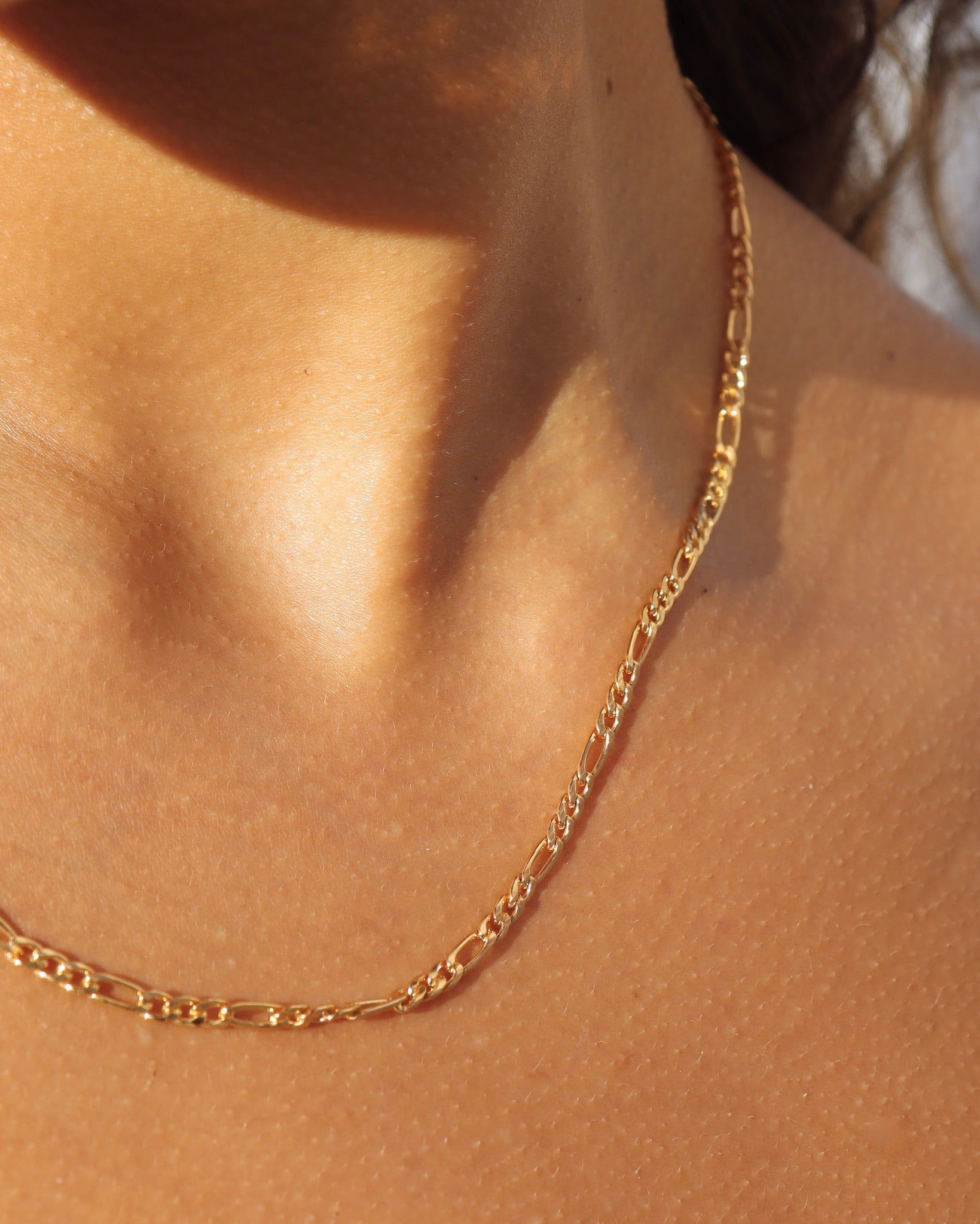 model wearing 14k gold fill chain necklace