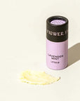 Lip balm with 'Flower Fair' branding on a light background