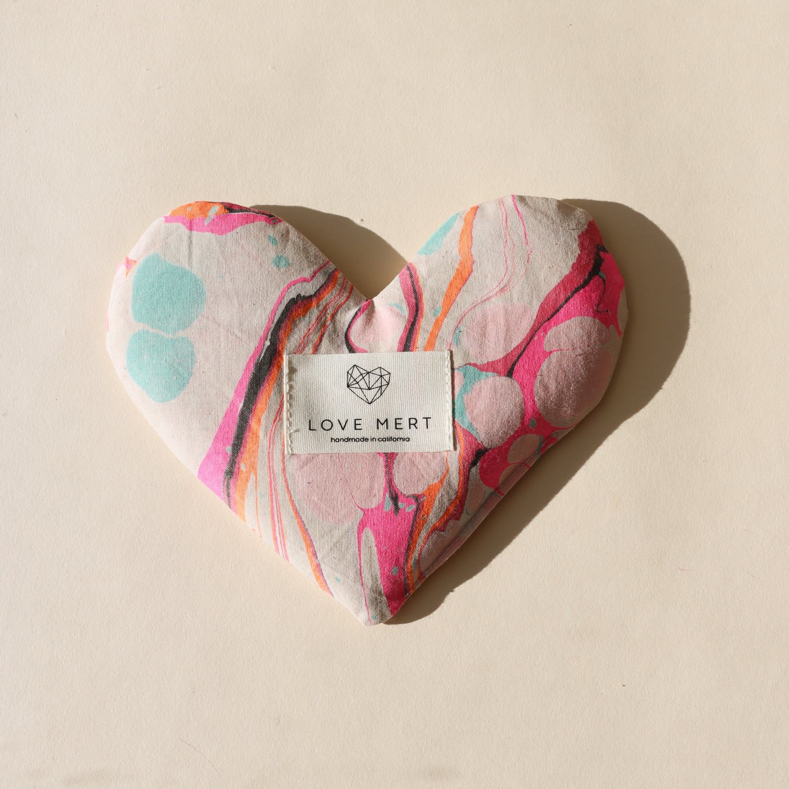 heart shaped eye pillow on a light background