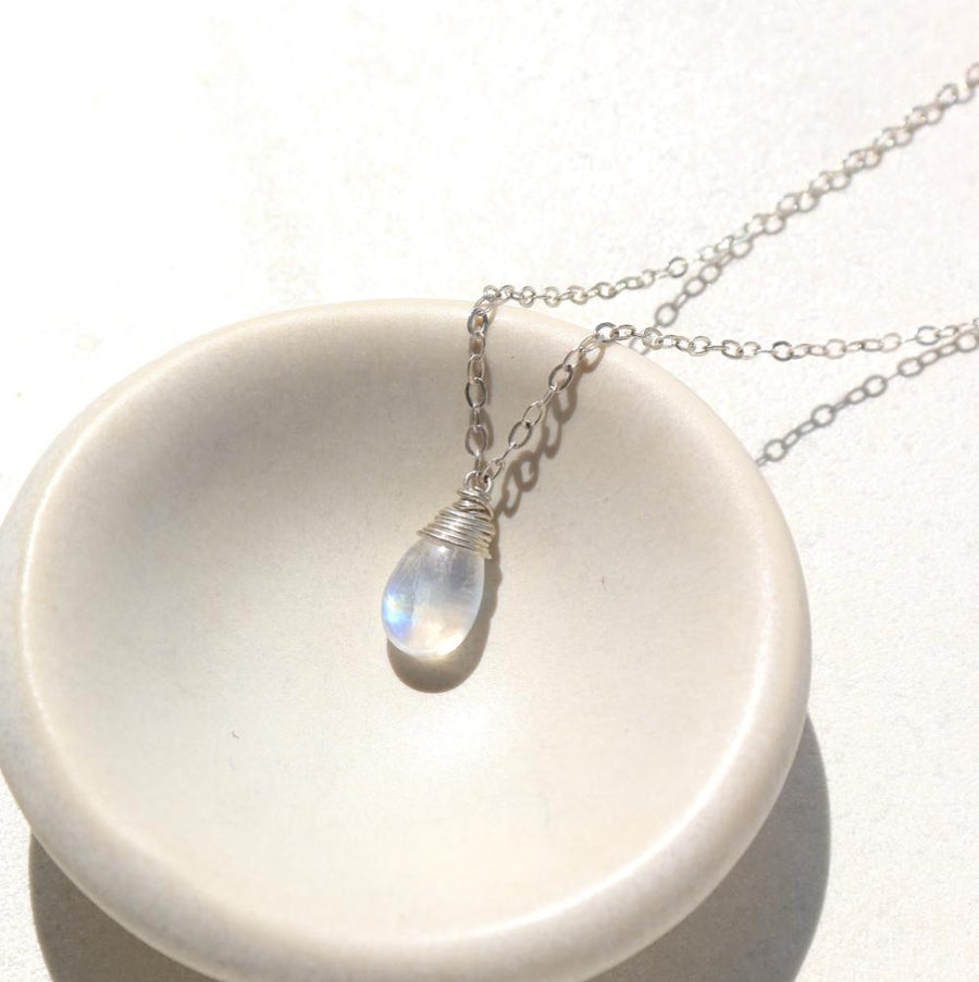 Sterling silver Celine necklace with moonstone in small stone dish.