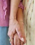 Model and her mother wearing 14k gold fill tiny Clara bracelet.