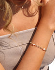 Model Wearing 14k gold fill Rosalie Pearl Bracellet