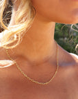 Model wearing 14k gold fill Narrow link chain 