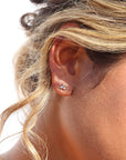 Model wearing 925 sterling silver element studs