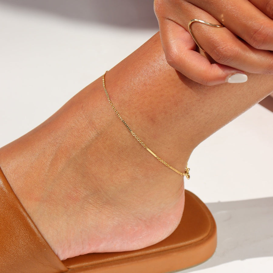 Model wearing 14k gold fill Sailor anklet