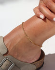 Model wearing 14k gold fill Roen anklet