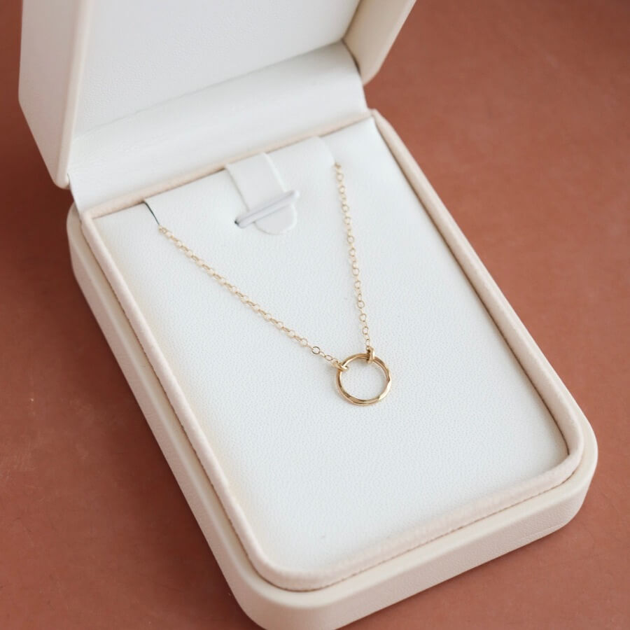 solid gold eternity necklace, smaller version of classic eternity, solid gold necklace, made in the USA, handmade in eau claire, wi, handmade jewelry, timeless jewelry, timeless designs, solid gold necklace, solid gold necklace, classic designs, timeless, elegant, everyday