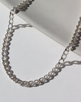 925 sterling silver curb chain anklet photographed on a white backdrop