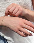 Model wearing 14k gold fill Sunburst Infinity ring